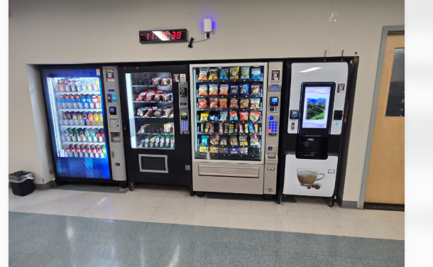 Existing industrial workplace setup with traditional vending and coffee machines